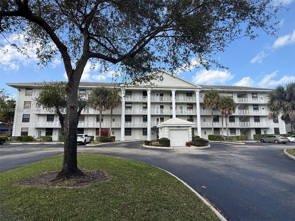 Photo of 1705 Whitehall Dr #102, Davie, FL 33324 (MLS # A11957804)