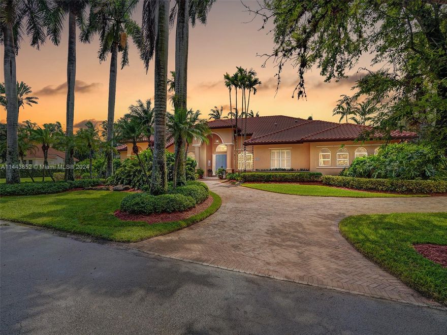 Welcome to this timeless Mediterranean style estate,tucked away in the unique 7 home gated community of Ambiance,just South of Baptist !This wonderfully enhanced,custom-built home offers an open floor design with high ceilings & Saturnia marble floors thru-out! The sun filled formal living opens to an extensive coral stone deck, fountain & large covered terrace w/ views of saltwater pool/spa refinished in 2023! The large formal dining room offers views of a private courtyard. Beautiful white wood kitchen & oversized granite countertop island plus separate breakfast area are just adjacent to a large family room w/custom wood cabinets & entertainment center overlooking private resort style backyard with lush tropical landscaping, perfect for entertaining! See supplemental Remarks!