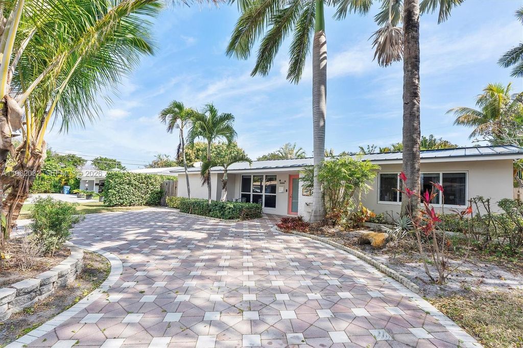 Photo of 4440 NE 17th Ave, Oakland Park, FL 33334 (MLS # A11962032)