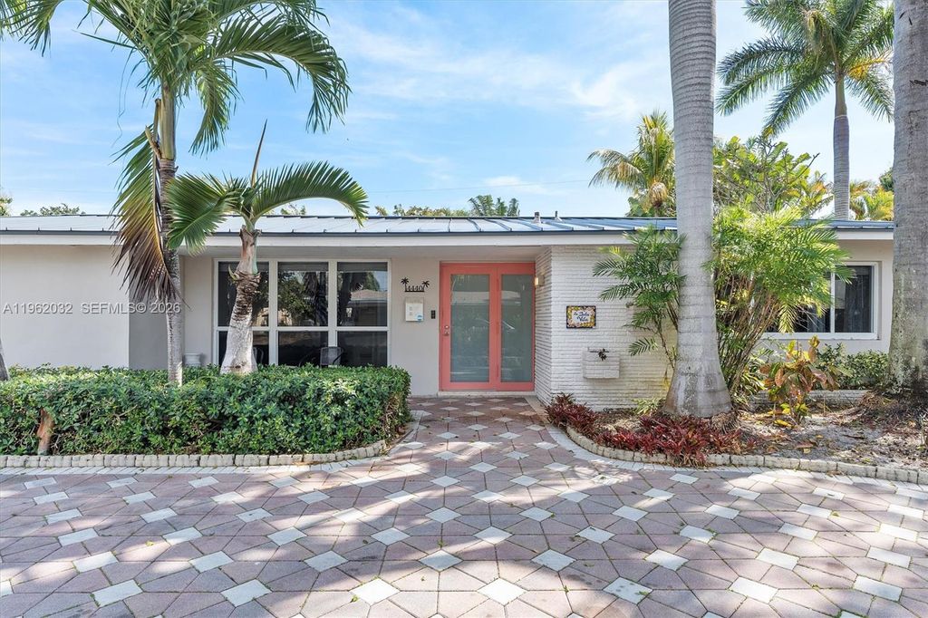 Photo of 4440 NE 17th Ave, Oakland Park, FL 33334 (MLS # A11962032)