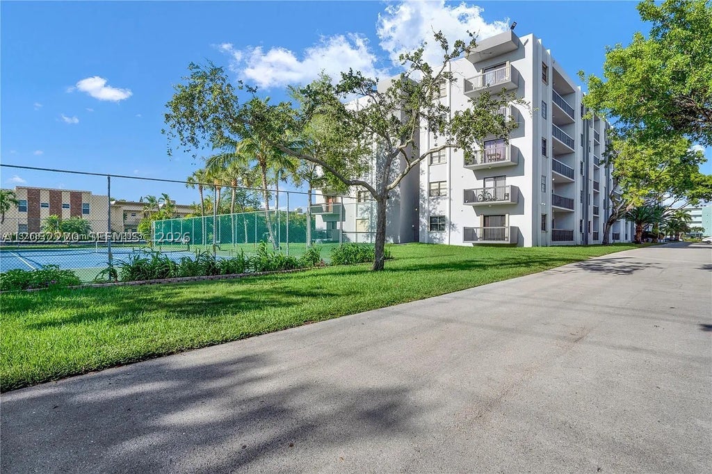 Photo of 1301 NE 7th St #405, Hallandale Beach, FL 33009 (MLS # A12052220)