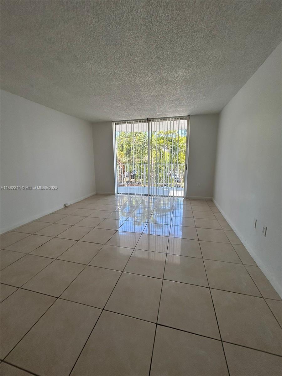 Spacious 1-bedroom unit featuring a walking closet and a convenient powder area. The bathroom has been recently updated with stylish new tile floors and a modern cabinet, making it both functional and attractive. The kitchen is equipped with stainless steel appliances, perfect for cooking and entertaining. Plus, enjoy the comfort of central air conditioning throughout the unit.