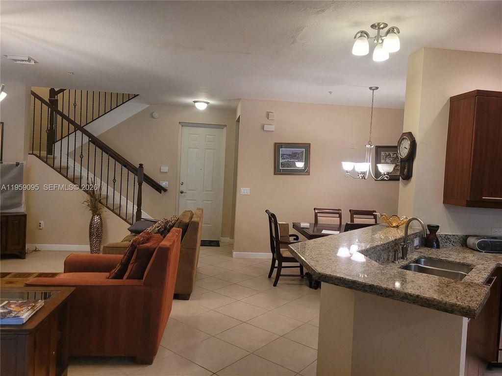 Photo of 2901 NW 126th Ave #2-101, Sunrise, FL 33323 (MLS # A11959095)