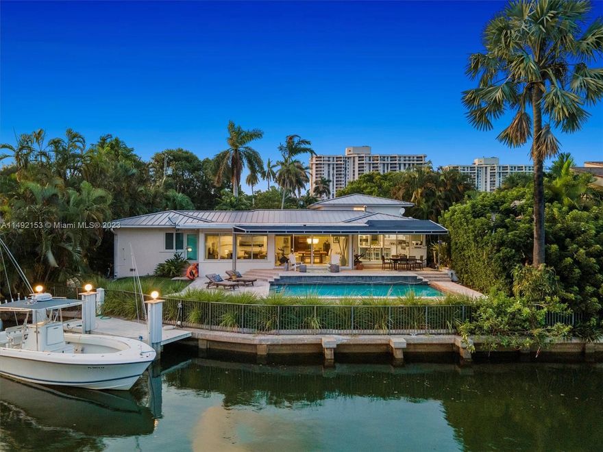 Don't miss this opportunity to buy this waterfront gem in an exceptional location! Nestled within the coveted Miami Shores neighborhood, this spacious property w/ over 2900 living SF graces the shores of Biscayne Bay, located on a serene canal - offering swift access to the open ocean. Enjoy over 90ft of waterfront. Discover a stunning 3-bed (3rd bed is a converted garage), a 3-bathroom residence that boasts an expansive interior, highlighted by a generous kitchen, a refreshing pool paired with w/a built-in grill & an accompanying deck tailored for boating enthusiasts. This remarkable dwelling is situated on nearly 10,000 SF of land, adorned w/ vibrant landscaping. Positioned on a peaceful cul-de-sac to the east of Biscayne. Some upgrades include a metal roof 7 years old.