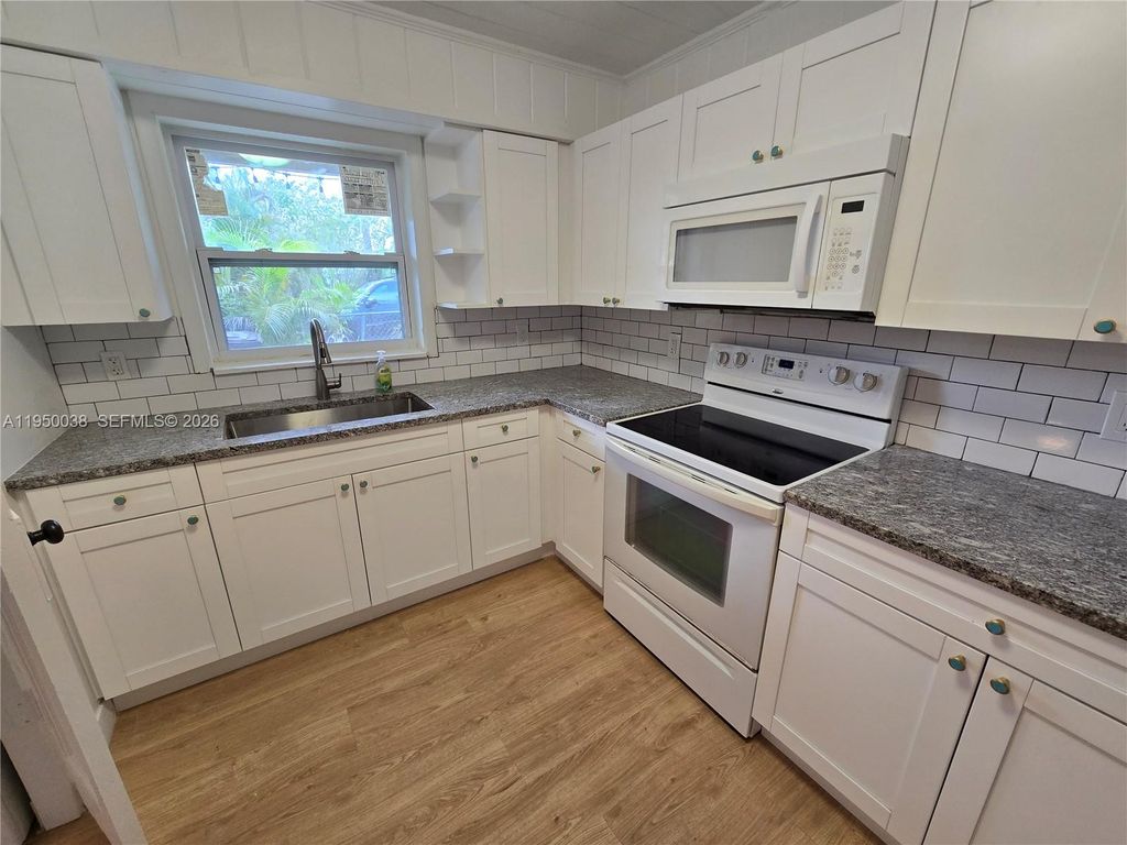 Photo of 4000 Greenwood Ave #1, West Palm Beach, FL 33407 (MLS # A11950038)