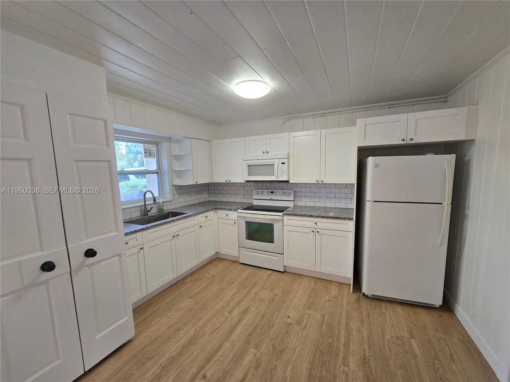 Photo of 4000 Greenwood Ave #1, West Palm Beach, FL 33407 (MLS # A11950038)