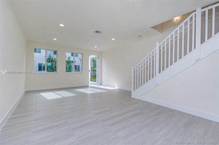 Spacious unit at Landmark at Doral. This 3 bedroom 2.5 bathroom townhouse has an open area with kitchen, living and dining perfect for entertaining. The modern kitchen features a deluxe stainless steel appliance package and quartz countertop. Walk in closets and master bathroom with dual sink and large shower are very spacious. The home is equipped with the most up to date technology, Wi-Fi ready. The community offers resort style amenities, with tennis courts, pool, and gym. Various schools as well as parks in the area.