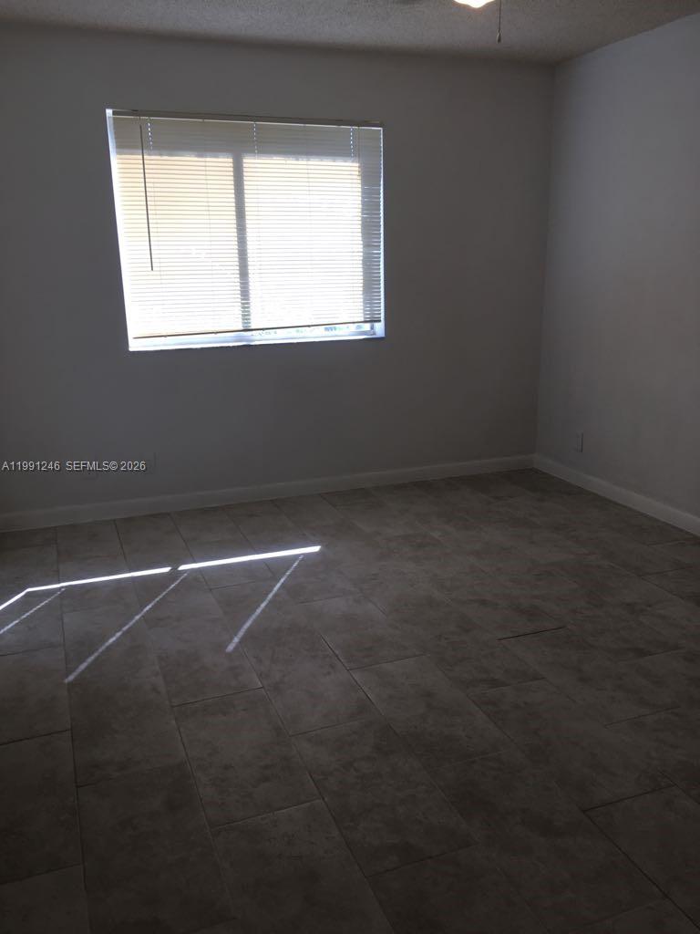 GARDENS NORTH 11 CONDO - Residential Lease