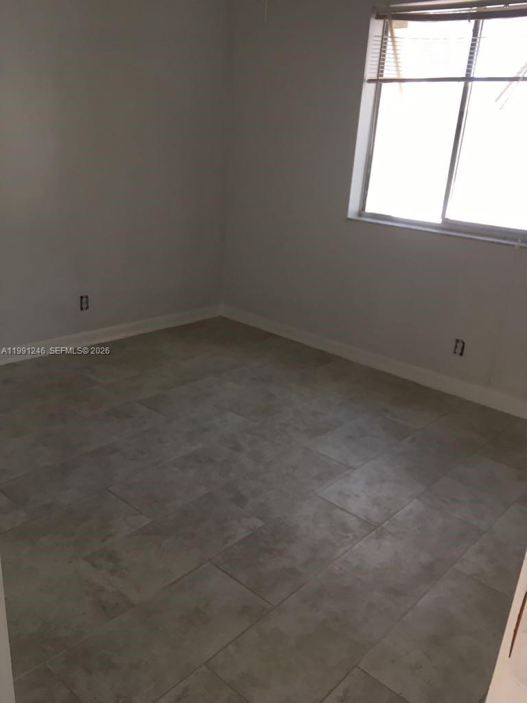 GARDENS NORTH 11 CONDO - Residential Lease