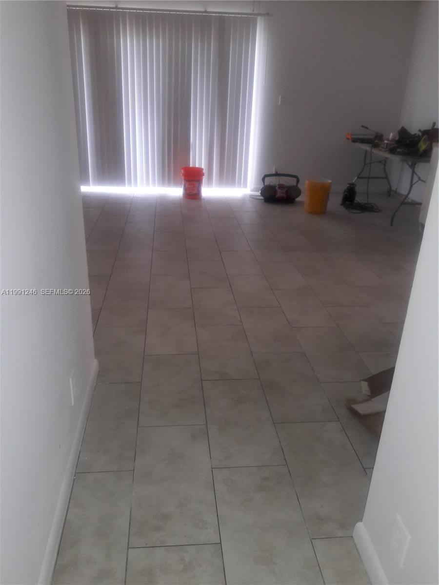 GARDENS NORTH 11 CONDO - Residential Lease