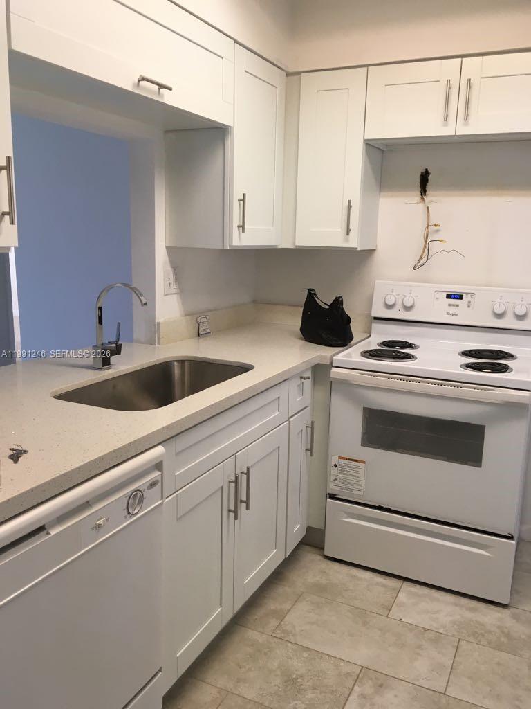 GARDENS NORTH 11 CONDO - Residential Lease