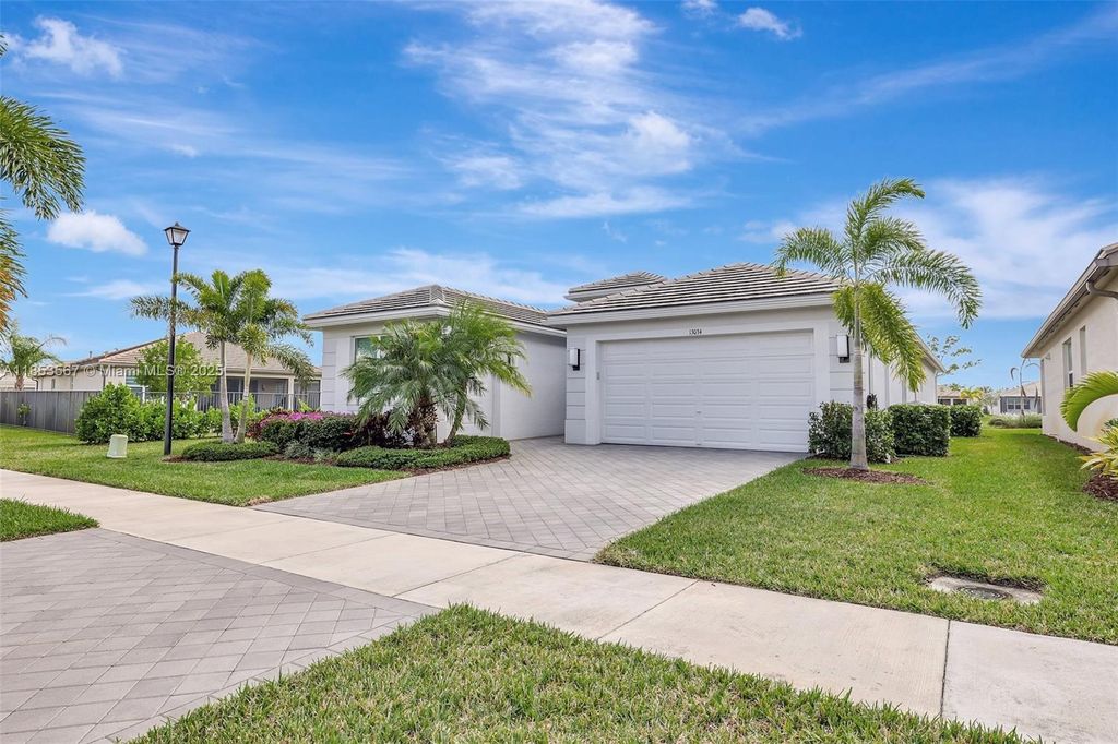 Photo of 13034 SW Brook View Ter, Port St Lucie, FL 34987 (MLS # A11853567)