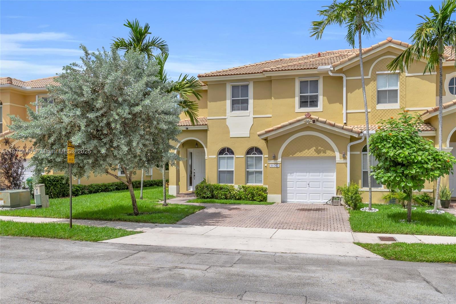 2-story corner townhouse in the desirable Kendall Breeze West community! Featuring 3 bedrooms, 2.5 bathrooms, a formal living room, cozy family room, and kitchen perfect for gatherings. The family room opens to a private fenced patio, ideal for entertaining. Additional highlights include a convenient half bath on the first floor, utility room, one-car garage, and hurricane shutters. Spacious master suite with large bathroom featuring tub and separate shower. Home needs TLC. Family-friendly community with clubhouse, pool, and more. Excellent location near Costco, Publix, Tamiami Airport, and major roadways. Priced to sell. Sold As-Is.