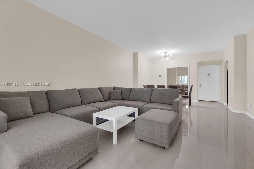 All Ages Welcome!  Fabulous and fully renovated 1/1.5 with beautiful garden views.  Enclosed balcony makes for a great additional room.  Hurricane proof windows and doors.  Beautifully tiled throughout.
9 Ft. Ceilings.  Updated white shaker kitchen cabinets with quartz countertops and stainless steel appliances.  New hot water heater.  996 SQ FT.  Building enjoys 24/7 security, heated pool and extra storage.  Steps to miles of walking paths and clubhouse with barbeques.  Access to pickleball and tennis courts.  Close to shopping, restaurants, beaches, Ft. Lauderdale Airport, Las Olas, Hardrock Hotel and Casino, Gulfstream Park & Racing, all major highways and the Famous Hollywood Boardwalk.