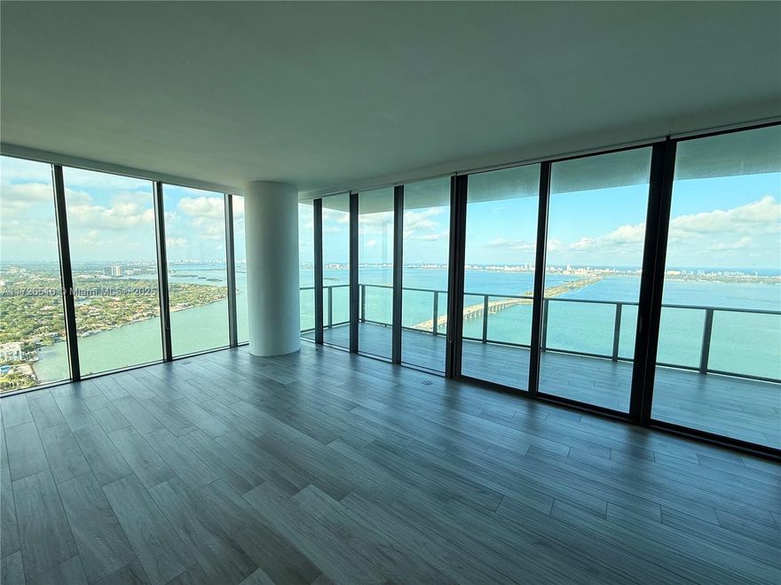 Stunning luxury building on the Bay front with unparalleled amenities. Spectacular corner Penthouse offering unobstructed WOW views, skyline, cruise ships, sunrise and sunsets. Complete privacy for the living room, primary bedrooms & baths facing the Bay/Ocean. 2 huge balconies. Upgraded kitchen has Wolf/Subzero appliances. High ceilings. Private elevator foyer. All bedrooms have own bathrooms including Office/maid's room plus a powder room. Laundry room has a sink & extra storage. 2 adjacent prime garage spaces & huge storage room. Found oasis in the city, rare 3 acre resort deck: 3 pools, private cabanas, summer kitchen, BBQs, tennis courts, various lounges, secluded areas, movie theater, business center, kids playroom, indoor jacuzzi, saunas, massage, gym, yoga, cigar lounge, billiards.