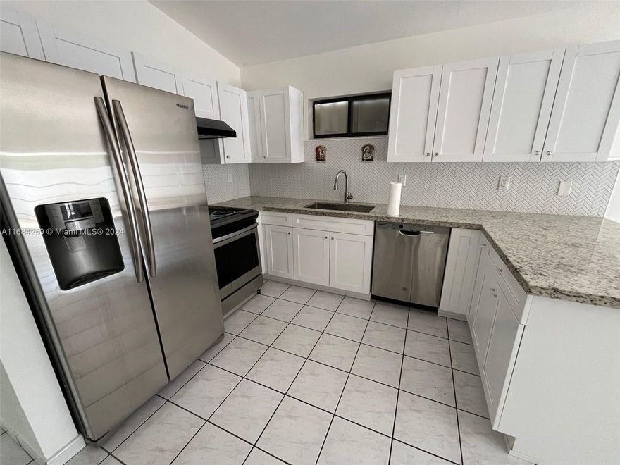 Impeccable Move-in ready 3 Bdrm / 2 Bathroom, 1,273 Ft2 cozy single family home on the market for the first time! NO HOA!! Sits on a 3,405 SqFt LOT, Renovated bathrooms & kitchen with ST STEEL appliances,inviting breakfast area, herringbone backsplash & granite countertops, Washer & Dryer, tiled throughout (NO CARPET!). Large Master Bedroom with walk-in closet. Plenty of closet space and NEW ROOF installed 2 years ago. Tranquil Property to call home with full back-yard patio ideal for entertaining & BBQs. Home's strategically located in a great neighborhood in the heart of Hialeah with great schools, within walking distance to Carl Slade Park (tennis, basketball, children playground) and easy access to 2 main expressways, shopping, restaurants, hospitals and much more.