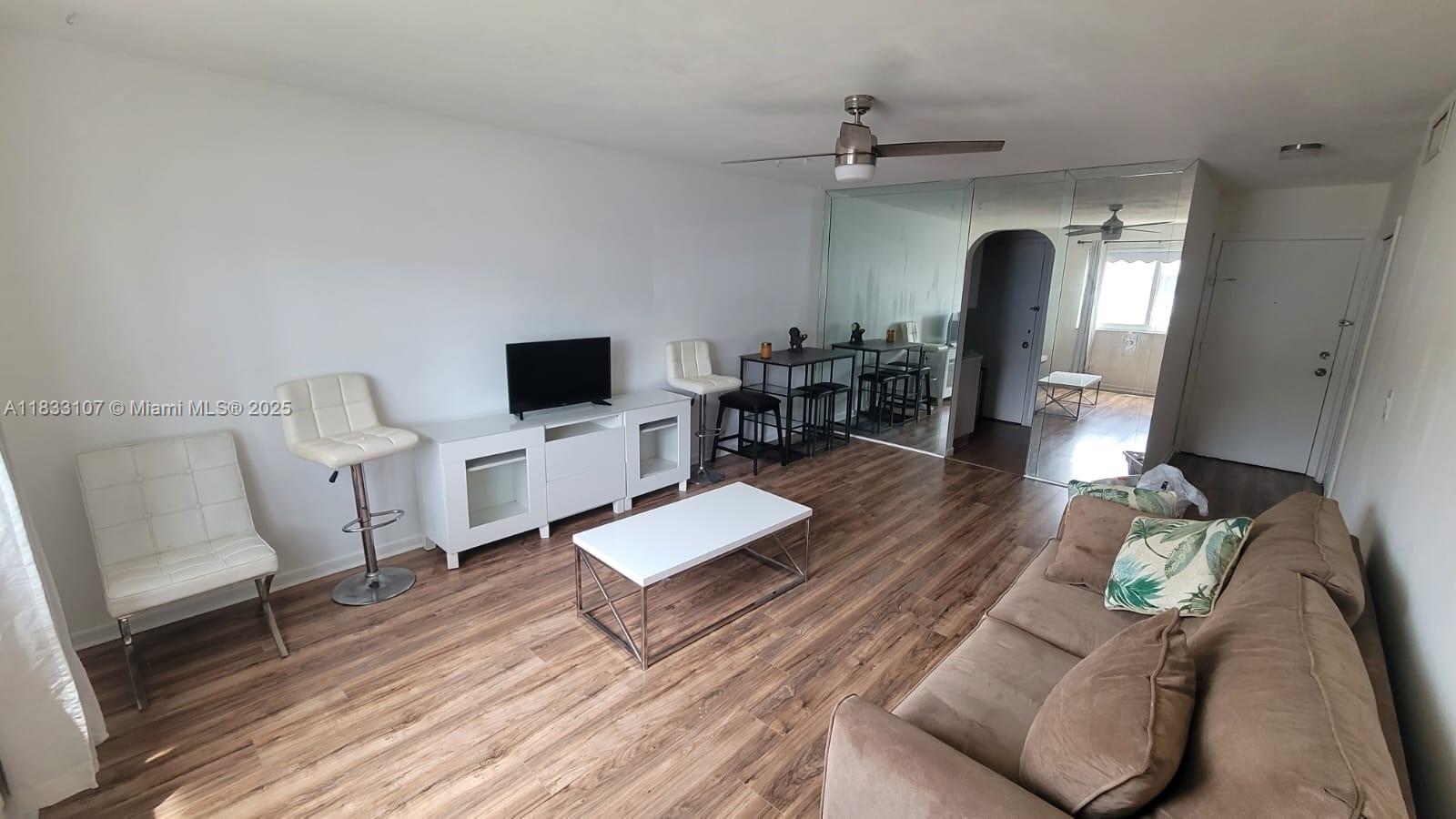 Charming 1st floor 1-bedroom, 1-bathroom partially furnished apartment in an amazing location! Just 2 miles to Fort Lauderdale Beach. Fully renovated modern bathroom with walk-in shower, easy to clean hardwood look flooring throughout, brand new stainless steel refrigerator, brand new AC and brand new impact windows! Huge walk-in closet and one assigned parking space . Enjoy community amenities including a heated swimming pool, Clubhouse, BBQ area, Shuffleboard and Community laundry. Comes with 1 assigned parking space, no pets allowed, 650 minimum credit score required.