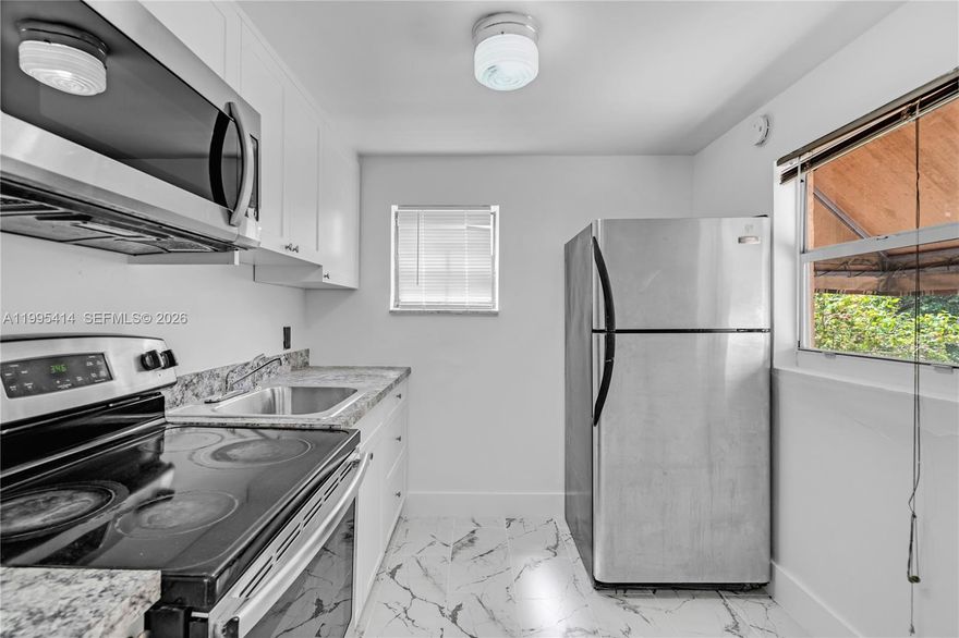 Completely remodeled, super clean & very modern extra large 1 BR apartment in apartment building that is very centrally located in the trendy Little Haiti neighborhood of Miami within a couple of blocks from I-95, 3 minutes from Miami Design District, 3 minutes from Wynwood, and 6 minutes from Downtown Miami. Brand new floors, new air conditioning, new stainless steel appliances, new kitchen cabinets, new bathroom and fresh new paint throughout. Section 8 vouchers accepted.