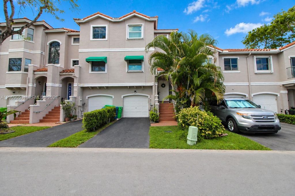 Photo of 1441 NW 126th Way, Sunrise, FL 33323 (MLS # A12009050)