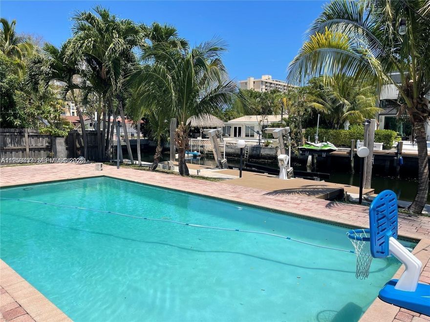 This 4-bedroom, 3-bath home in sought-after Keystone Point features an open floor plan filled with natural light. The property offers 75 feet of water frontage with a 24,000-lb boat lift and no fixed bridges, along with a large pool and spacious backyard.