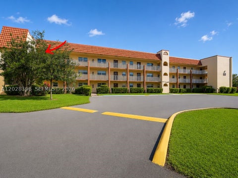 Photo of 2811 N Pine Island Rd #302, Sunrise, FL 33322 (MLS # A12028396)