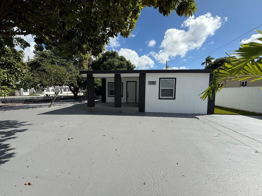 Welcome to 10597 NW 30 Ave! This beautifully remodeled three-bedroom, two-bath home is perfectly situated close to schools, shopping, and hospitals. It features new roof and new bright white-wood kitchen with elegant white quartz countertops, and all-new stainless steel appliances. High end interior doors. Bathrooms with LED mirrors and modern finishes. The spacious living and dining areas are perfect for entertaining, a brand-new central AC, and beautiful porcelain flooring throughout. Enjoy outdoor living with a great yard space with beautiful trees.