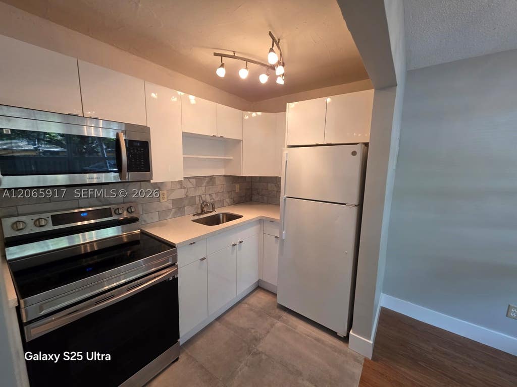 Photo of 4732 SW 33rd Ave #104, Dania Beach, FL 33312 (MLS # A12065917)