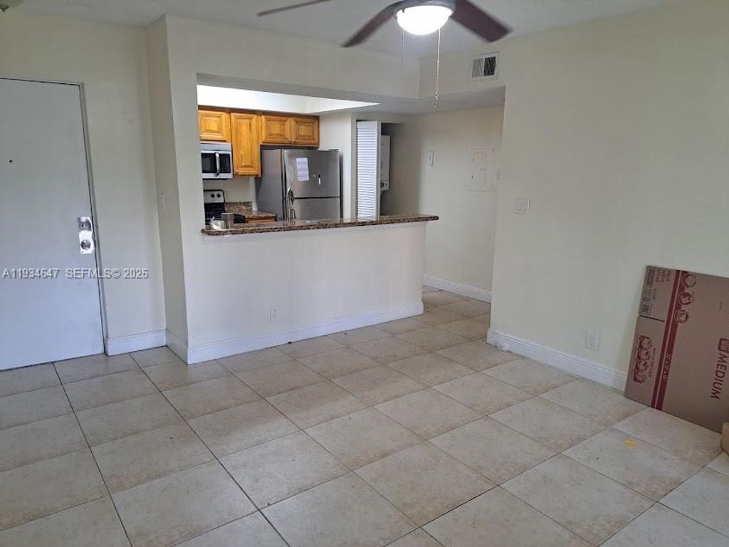 Photo of 5612 Rock Island Rd #156, Tamarac, FL 33319 (MLS # A11934647)