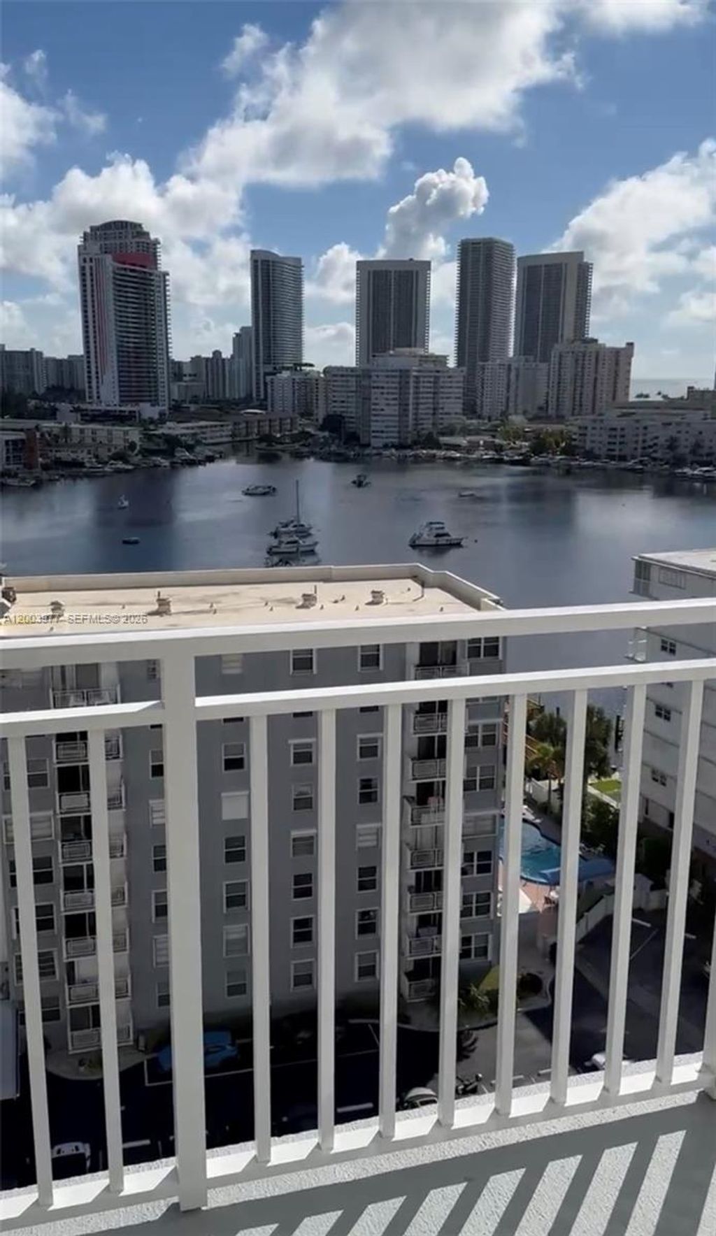 Photo of 427 Golden Isles Dr #14E, Hallandale Beach, FL 33009 (MLS # A12003977)