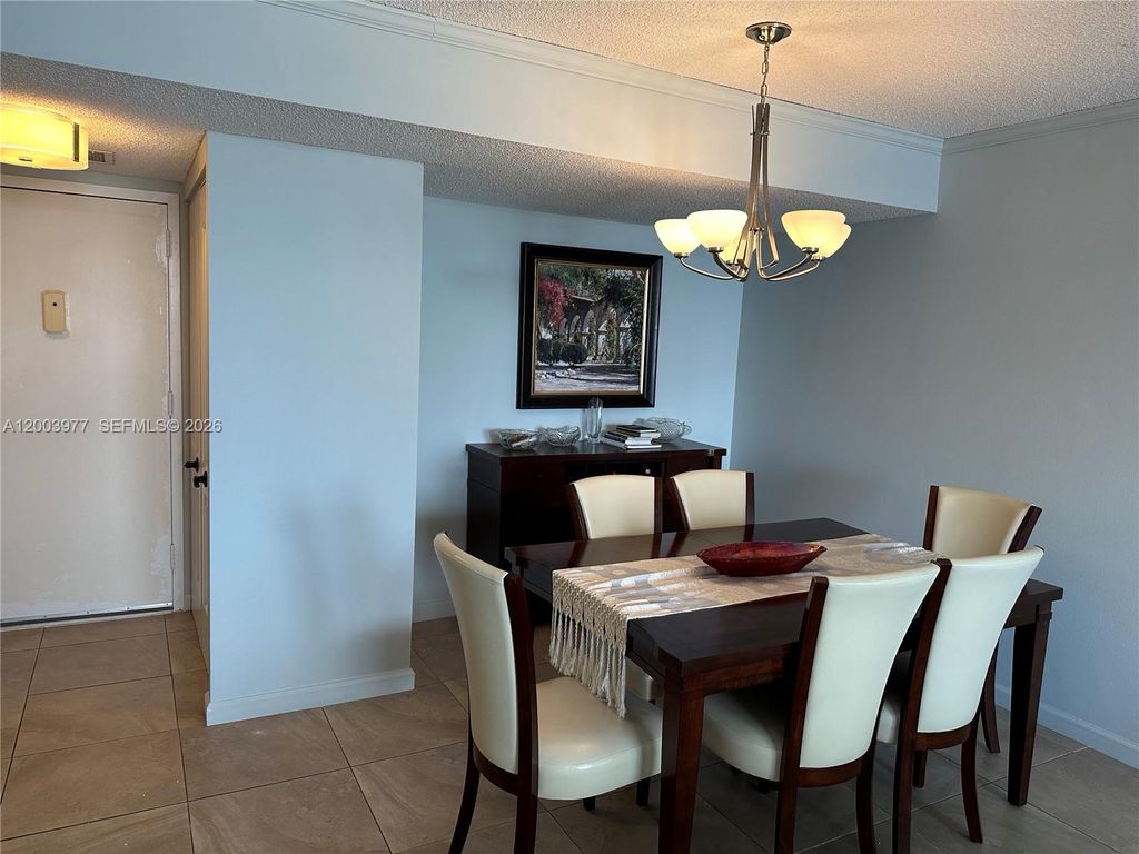 Photo of 427 Golden Isles Dr #14E, Hallandale Beach, FL 33009 (MLS # A12003977)