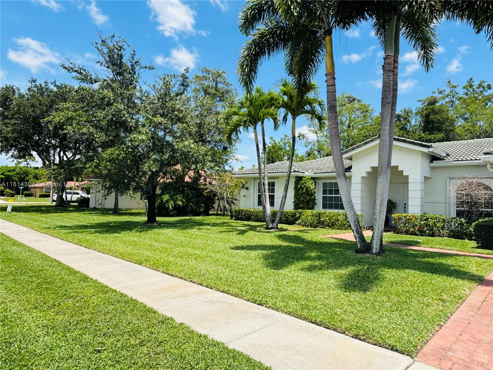 This Royal Palm Beach 3 bed 2 bath beauty in Saddle Brook a Crestwood Community, wont last!
As you enter the beautiful sun lit formal dining and living areas, you are met with beautiful views of the back yard. Off to the right is the spacious kitchen with granite countertops, overlooking the family room. Beyond the family room is a covered lanai, with breathtaking views of the gorgeous fruit trees and private nature preserve. Retreat to the primary bedroom, where you have a walk in closet, double sinks and a separate relaxing bath tub and shower. This Florida beauty with its negotiable furniture will not last.