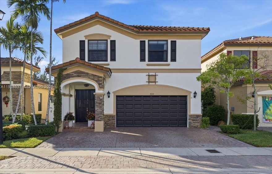Home for sale in Hialeah Gardens. This stunning 5-bedroom, 4.5-bath single-family home is in the highly desirable Aragon community of Hialeah. Built in 2015, this two-story residence offers over 3,084 sq ft of living area, a total of 3644 sq ft, with a smart, functional layout that’s perfect for large or multi-generational families.

Step inside to a bright layout with porcelain tile flooring seamlessly extending throughout the entire home, creating a modern and cohesive look. Enjoy spacious living and dining areas, plus an updated modern kitchen featuring stainless steel appliances, a wine cooler, and ample cabinetry—ideal for everyday cooking and entertaining. The converted, tiled 2-car garage under A/C provides flexible living space for a gym, office, playroom, or additional family room, while the large driveway still offers plenty of parking for multiple vehicles.

Upstairs, you’ll find well-proportioned bedrooms and excellent closet space, including 3 with their own bathroom for added privacy. With 5 bedrooms and 4.5 bathrooms, there’s room for everyone to spread out comfortably. 
Step outside to a fully tiled patio with a covered pergola, perfect for hosting family and friends. The space includes a built-in BBQ and prep area, great for outdoor cooking and weekend gatherings. It’s perfect for parties, cookouts, or simply relaxing after a long day.