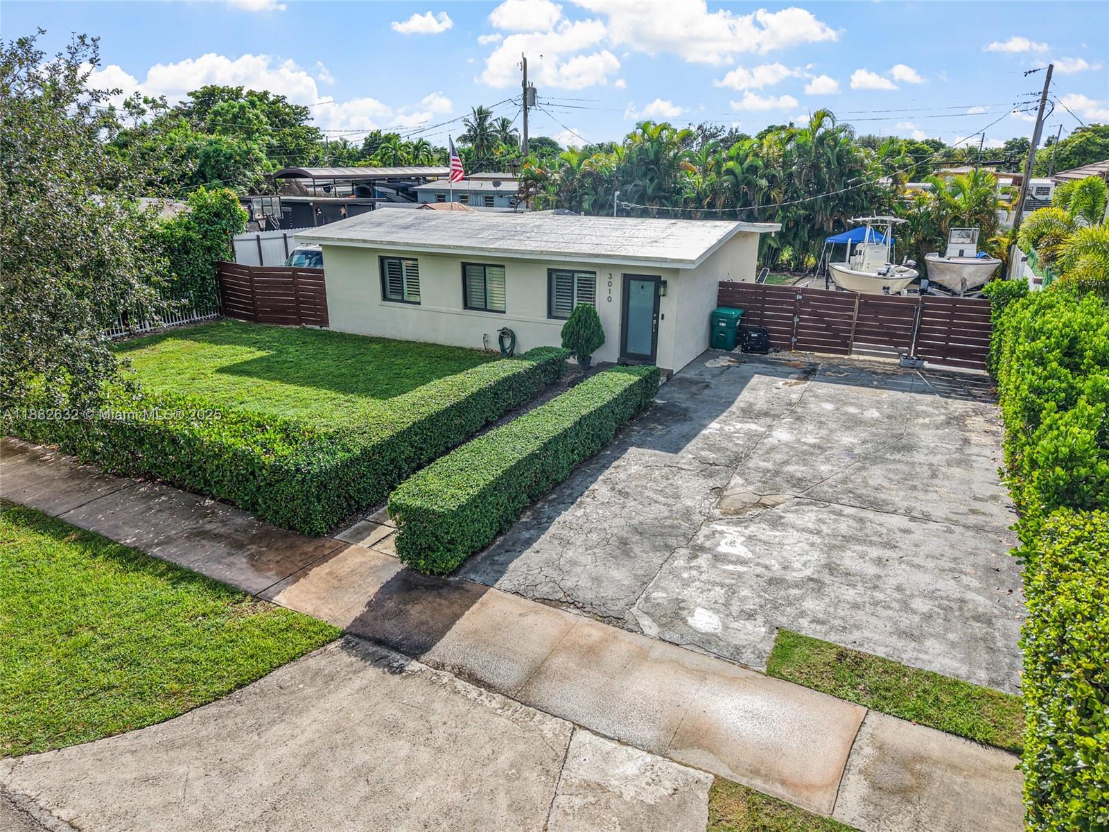 Charming 3 Bed/2 Bath Home in the Heart of Miami. This Home Features a Large Open Kitchen with SS Appliances and Wooden Cabinets, an Updated Bathroom, Tile Floors Throughout, and a Large Driveway with Room For 4 Cars. Large Backyard Perfect for Entertaining Family and Friends. Location Offers Easy Access to All Major Roadways, Shopping, Dining, Public Parks, and Public Transportation.