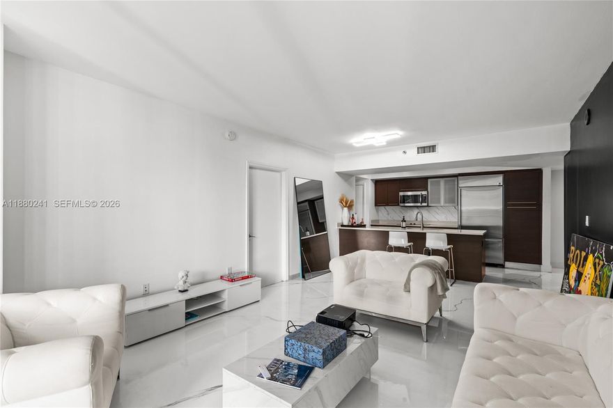Motivated seller! Spacious & luxurious 2BD/2BA in the heart of Brickell! Fully renovated and fully furnished, with brand-new AC and washer/dryer, plus modern finishes and great natural lighting. Enjoy resort-style living with a rooftop pool with panoramic views, a state-of-the-art fitness center, and a luxurious spa. Additional amenities include a club room, sports bar, movie theater, and 24-hour concierge and valet parking. Amazing location—walking distance to Brickell City Centre, top restaurants, and entertainment. Flexible monthly rentals allowed—perfect as a primary residence or investment. Move-in ready!