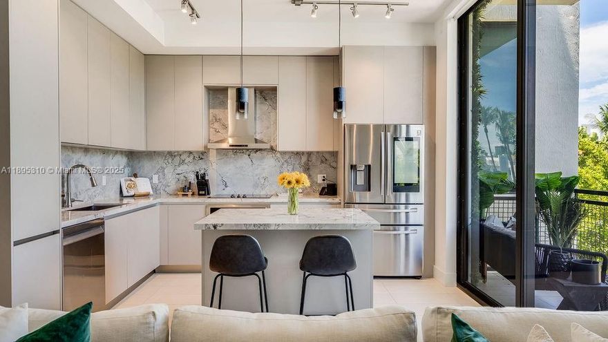 Experience South Beach sophistication in this spacious 1 Bed + Den / 2 Bath residence. Sun-filled and move-in ready, it’s designed with chic modern style and effortless comfort. The den includes a queen Murphy bed that folds away, creating a versatile office or guest space. Both bathrooms feature sleek frameless rain showers and elegant finishes. Enjoy two private terraces with city views, luxury amenities, an Italian-designed kitchen with Smart Samsung appliances, walk-in closets, and in-unit laundry. One block from Lincoln Road and minutes from the beach, you’re surrounded by South Beach’s best dining and exclusive fitness clubs like Anatomy and Equinox. With strong rental history, it’s the perfect investment or retreat to live your South Beach dream.