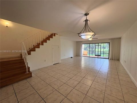 Photo of 3855 Estepona Ave #10-D-1, Doral, FL 33178 (MLS # A11961615)