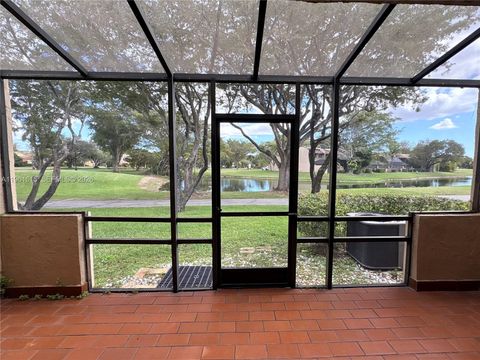 Photo of 3855 Estepona Ave #10-D-1, Doral, FL 33178 (MLS # A11961615)