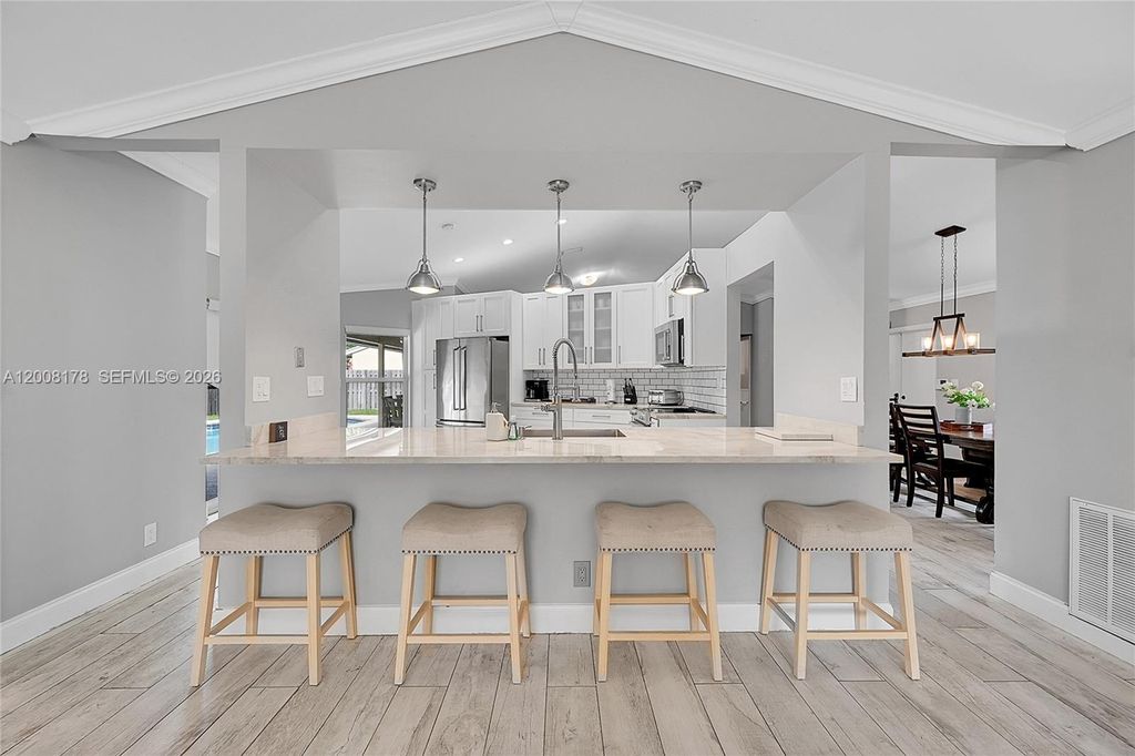 Photo of 9841 SW 1st St #9841, Plantation, FL 33324 (MLS # A12008178)