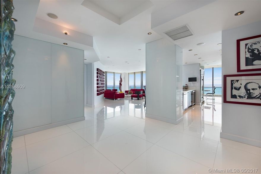 MAGNIFICENT CORNER SKY HOME (F) LINE WITH INFINITY VIEWS OF THE OCEAN & INTRACOASTAL. CUSTOM
DESIGNED COSMOPOLITAN LAYOUT. METICULOUSLY DECORATED WITH ATTENTION TO DETAIL FROM FLOOR TO
CEILING. SUPERB APPOINTMENTS AND FINISHES. PERFECT FOR ENTERTAINING. FULL SERVICE LUXURY BUILDING OFFERS OPULENT RITZ CARLTON WORLD CLASS HOTEL AMENITIES AND BEACH ACCESS WITH POOL SERVICE.