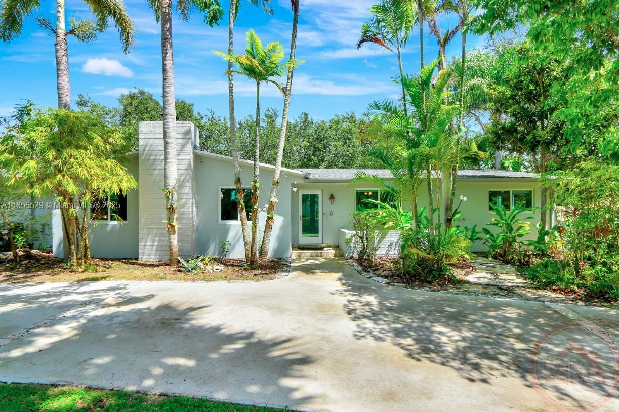 Spacious 3BR/2BA single-family home on 1.07 acres with resort-style outdoor living! Enjoy a sparkling pool with cascading waterfall, a tranquil lagoon, and a gazebo perfect for hosting gatherings. The expansive backyard offers endless space for entertaining or relaxing. Inside, the home provides generous living areas and comfortable bedrooms—ideal for both everyday living and special occasions.