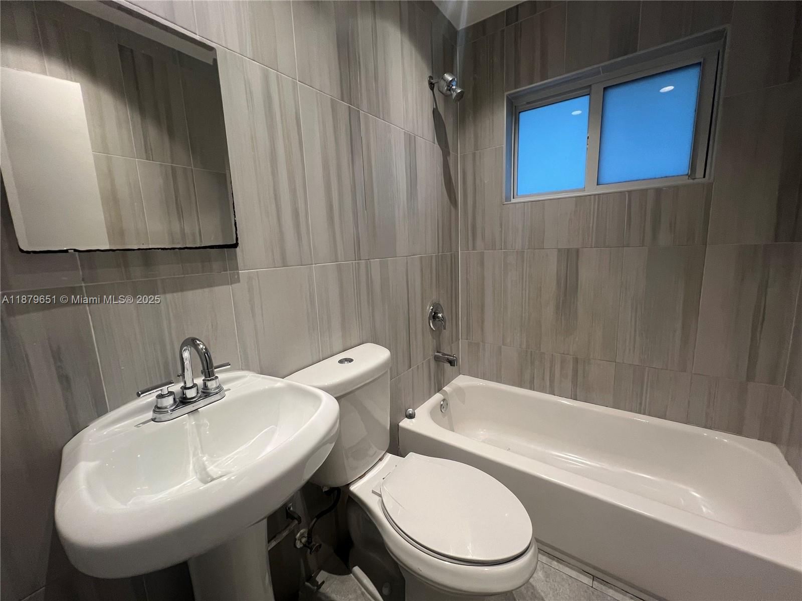 This 2 bedroom is full of designer touches that you are sure to love!
Deep moody wall colors, a well appointed kitchen, off street parking and onsite laundry make this the perfect location to soak up the South Florida sun while enjoying the artistic lifestyle in the Wynwood Arts District!
