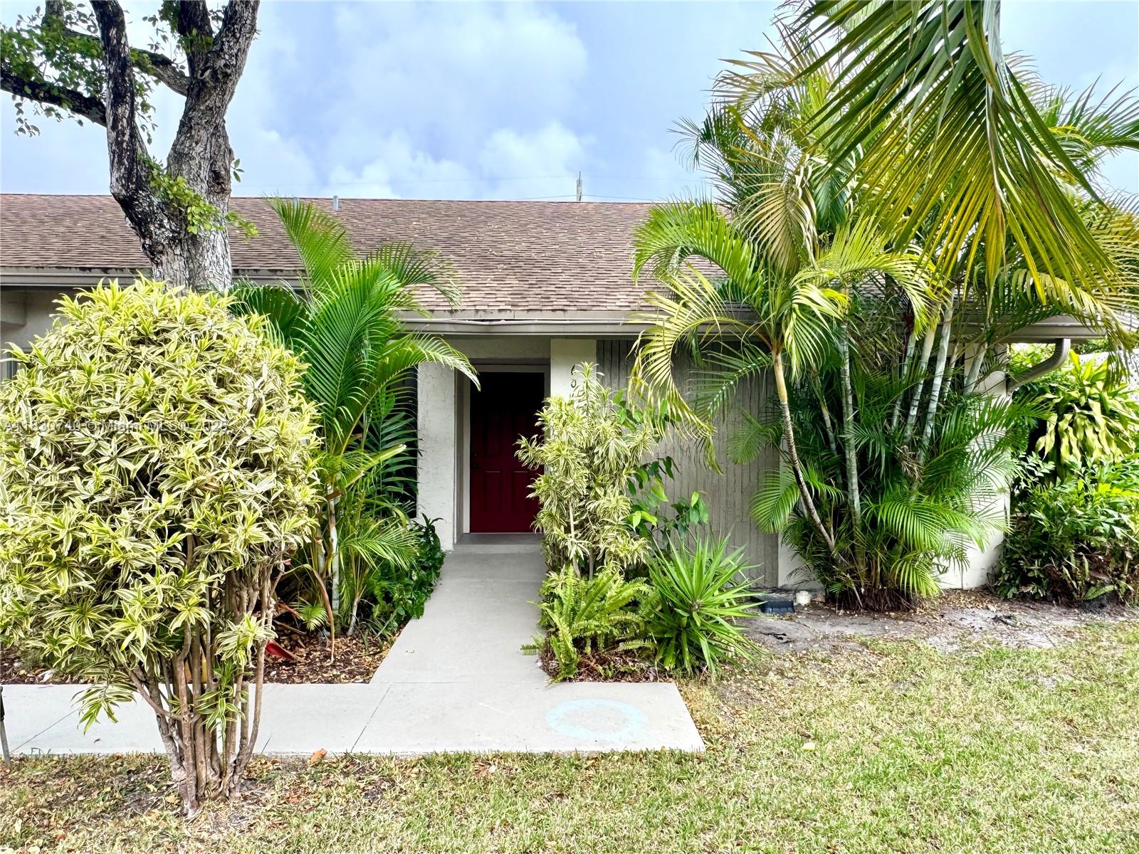 Welcome to this beautiful private end unit oasis 2 Bed | 2 Bath Ranch Style Villa in a meticulously maintained gated community offering lots of amenities! Vaulted ceilings and a private enclosed patio makes this unit a true gem! Updated Kitchen with all new appliances (2025), tile flooring, central AC, hurricane impact windows, and new washer and dryer (2025) inside the unit! Primary bedroom has large walk-in closet and ensuite which has been updated! 2nd bathroom also completely updated! 2 parking spaces and plenty of guest parking. No special assessments and NOT in a flood zone! Amenities include heated pool w tiki hut, lounge, gym, playground, tennis courts, walking trails all in a scenic backdrop! Minutes to 95, FL turnpike, Wilton Manors, & the airport. Can be purchased with 3% down!