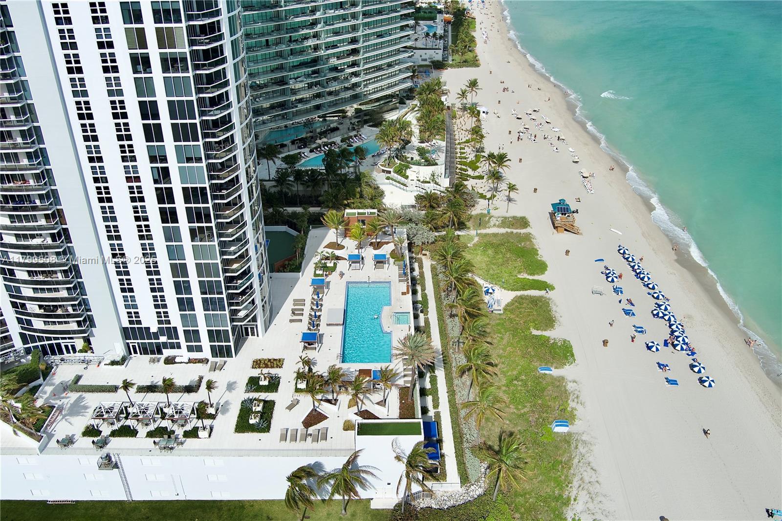 Direct ocean view from the living room, main terrace and from two of the three bedrooms. The private elevator takes you directly to your condo with three full en-suite bedrooms, master with king bed, second with two full beds and third with one queen bed. Additional room = den/private office. City/ intracoastal views from third bedroom, kitchen, dining room and west terrace - yes, it has two terraces! Elegant marble flooring throughout and tastefully furnished. Located on the beach, resort style amenities: full service beach and pool, tennis court, sauna, gym...