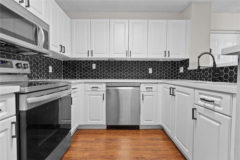 Photo of 2123 Renaissance Blvd #201, Miramar, FL 33025 (MLS # A12021303)