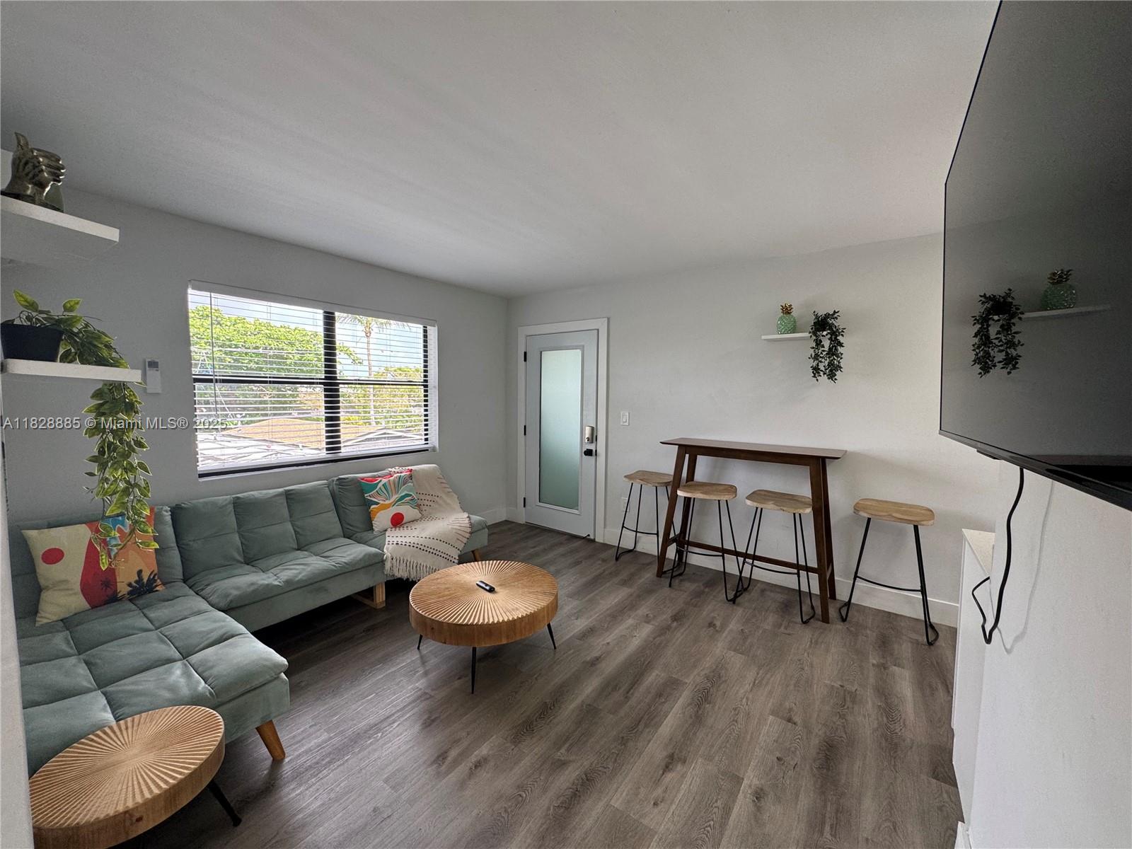 Live where art culture and nightlife meet! Unit can come furnished or not. This awesome two bedroom one bath in the heart of Wynwood. This modern unit features in open layout, wood laminate floor floors, stainless steel appliance appliances, white marble, light countertops, and on premise laundry enjoy Central A/C and a communal backyard walk to Wynwood walls top restaurants, cafés, Art, galleries and shops minutes from downtown Miami Beach and major highways pet friendly with approval