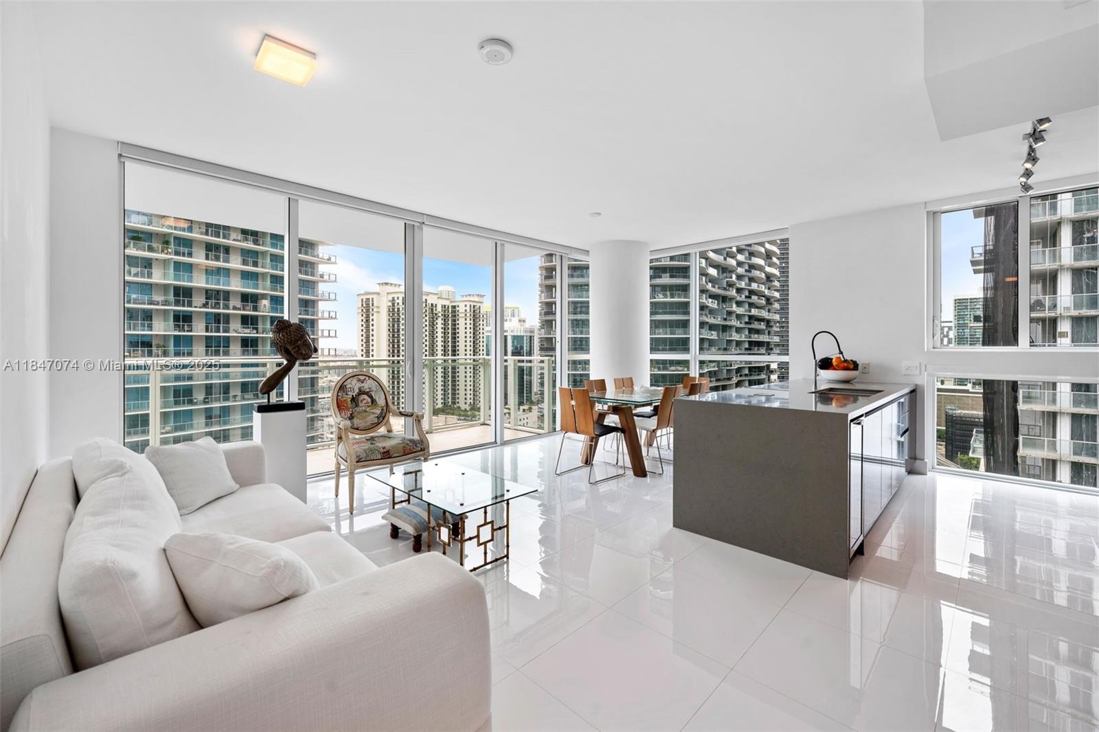 Spectacular 2 Bed + Den / 2 Bath corner unit at The Bond—fully furnished with exceptional taste and flooded with natural light from floor-to-ceiling windows. Features include Nolte kitchen cabinetry, Bosch appliances, wine cooler, Porcelanosa fixtures, white porcelain floors, Nest thermostat, and an extended balcony—available in only a few units. The spacious den can easily serve as a third bedroom or home office. Enjoy stunning city views and a prime location just steps from Brickell City Centre, top restaurants, and nightlife. The Bond offers five-star amenities with a pool and cabanas, BBQ stations, fire pit, state-of-the-art gym, sauna, kids' playroom, 24/7 concierge & valet, and more.