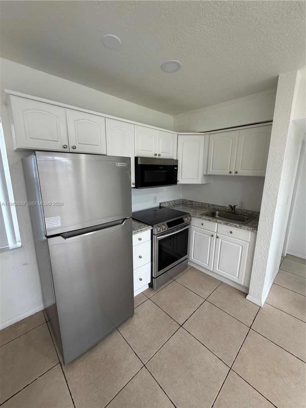 Photo of 830 SW 6th St #3, Hallandale Beach, FL 33009 (MLS # A11962857)