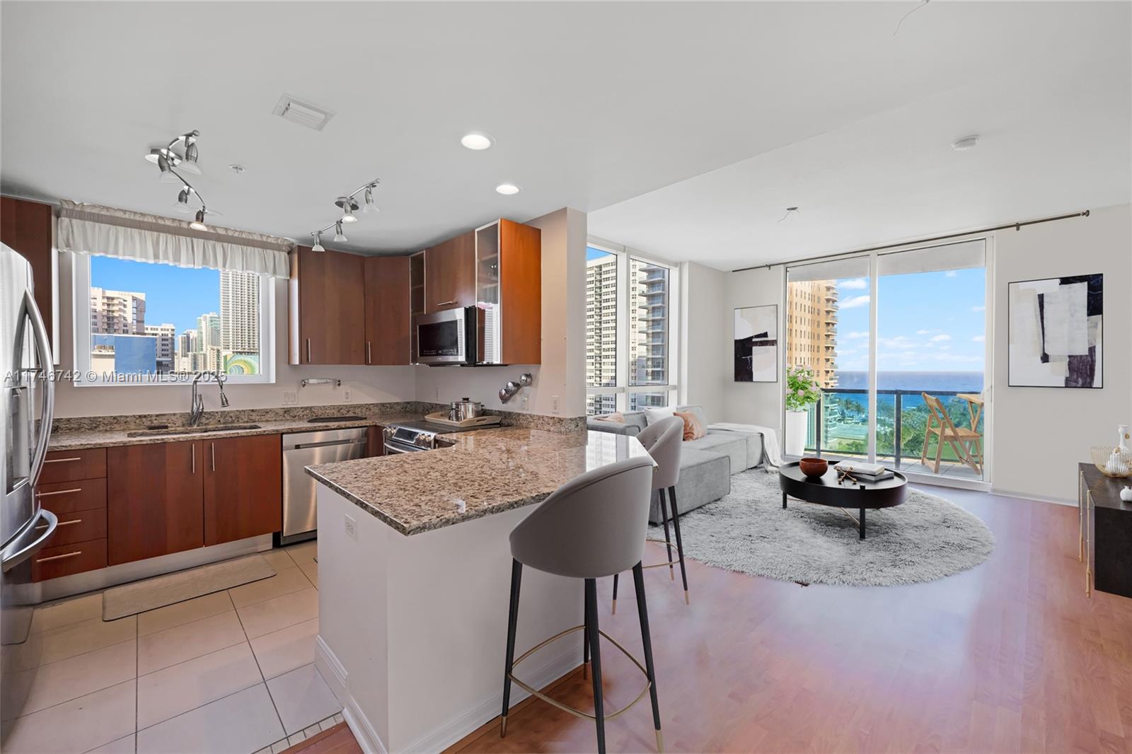 Discover luxury living in this 2-bedroom, 2-bathroom corner unit just steps from the beach. Enjoy breathtaking ocean, Intracoastal, and city views through floor-to-ceiling windows. The modern split floor plan features an open kitchen with granite countertops, stainless steel appliances, a walk-in closet, washer/dryer, and extra storage. Ocean Marine Yacht Club offers resort-style amenities, including 24-hour concierge, pool, gym, business center, and covered parking. Experience convenience and elegance in one prime location.