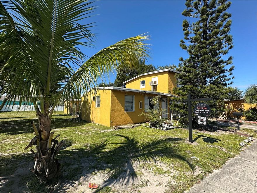 Exceptional investment opportunity on a 0.33-acre. With some repairs and renovations this will make a great primary residence and potential income producing property. Located in a growing and revitalized area, perfect as a multi-family unit or duplex. This is a mixed use property with 4 separate buildings, 2 residential and 2 commercial. Fully fenced corner lot property with paved parking lot with 16 spots. An additional ~0.2-acre vacant lot behind the property (not listed in this sale) will be available soon, offering even more potential for future owner. Prime location just minutes from downtown Ft. Lauderdale & beaches. Don't miss this great investment opportunity. Sold as-is. Huge potential for visionary owner, investors or developer. ** PRICE REFLECT LAND VALUE ONLY. PRICED TO SELL**