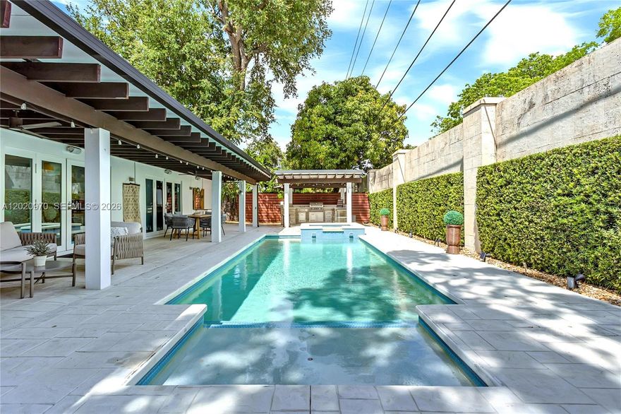 Spectacular opportunity in highly desirable Bay Heights, one of Miami’s most sought-after neighborhoods, ideally located next to Vizcaya and just minutes from Coconut Grove, Brickell, Coral Gables, top schools, parks, marinas, shopping, and dining.

This beautifully distributed home offers comfort, functionality, and an exceptional indoor-outdoor lifestyle. Filled with natural light, it features a spacious and practical layout with 6 bedrooms and 5 bathrooms, heated pool with hydromassage, private gym, and an incredible outdoor entertaining area complete with built-in gas BBQ, outdoor kitchen, refrigerator, and Denon sound system with Polk speakers throughout the patio—perfect for enjoying Miami living year-round.

Additional highlights include solar panels for energy efficiency, interior and exterior security cameras, EV charging installation with Supercharger capability for faster vehicle charging, and a Tonal smart home gym included for the convenience of a private fitness experience at home.

A rare opportunity to own in an exceptional location offering privacy, comfort, security, and the lifestyle Bay Heights is known for.